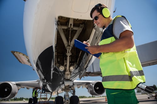 Aviation - guy working on plane