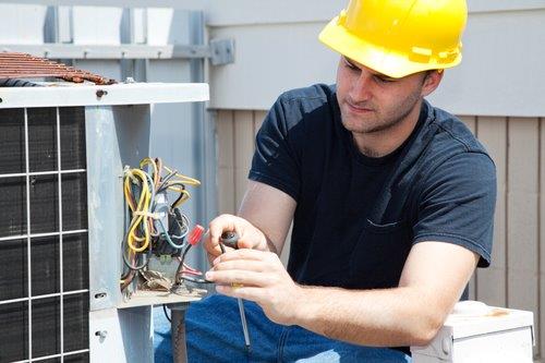 Electrician installing air conditioner 1